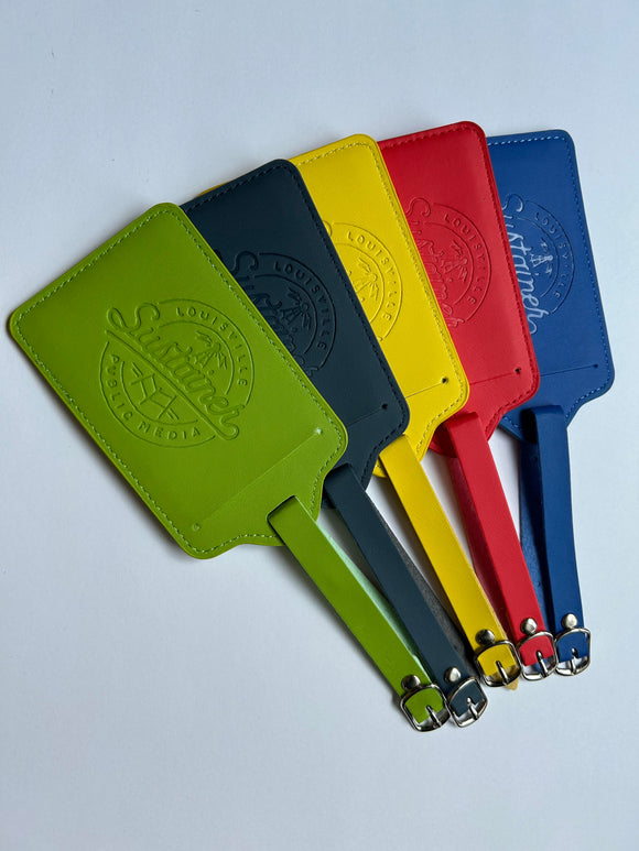 $5/mo. Sustainer Gift - LPM Luggage Tag